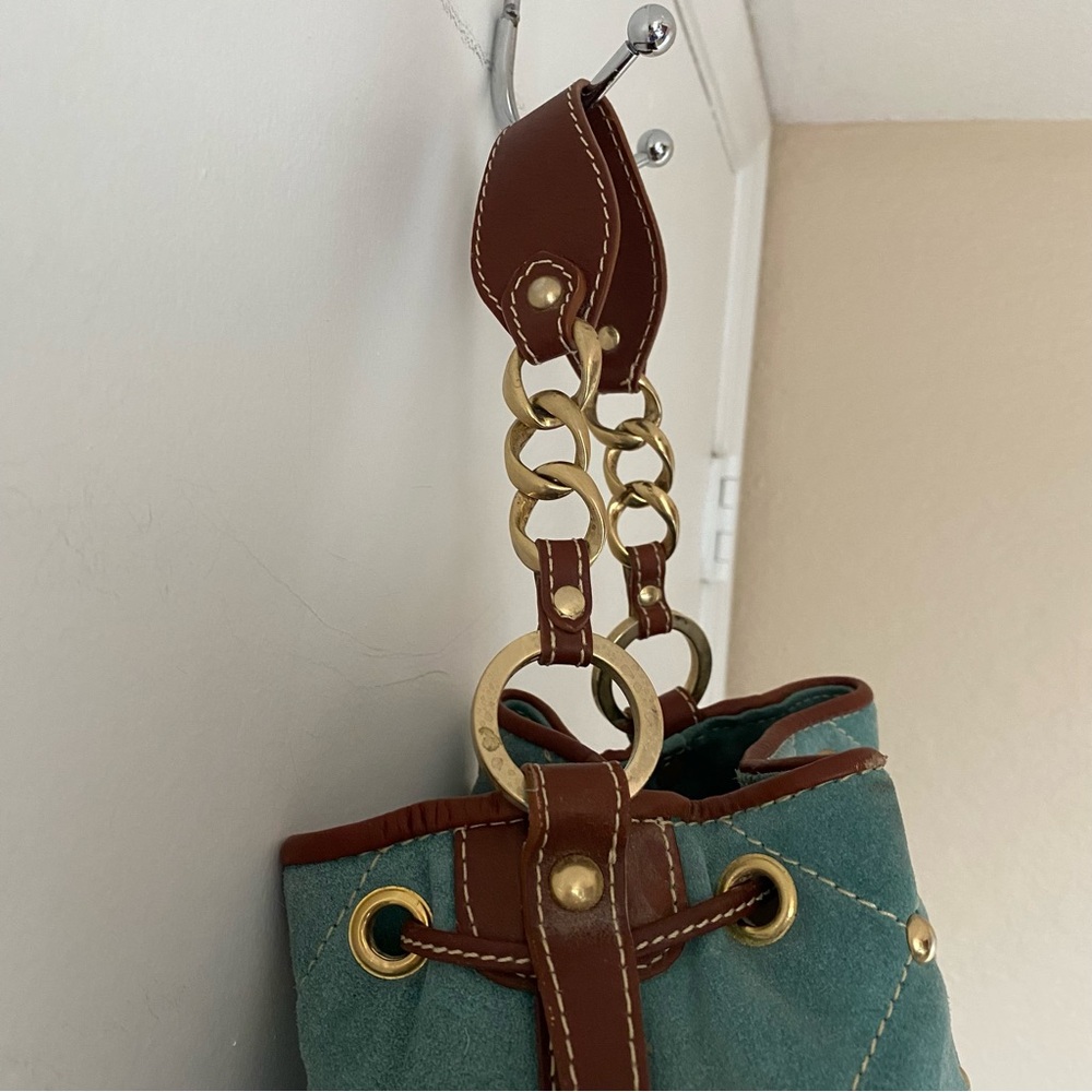 Claudia Firenze Quilted Drawstring
Nubuck Leather Handbag Studded
Bucket Bag - Picture 12 of 16